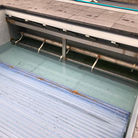herstelling groot zwembadrolluik